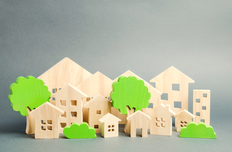 Picture of wooden house cut outs with trees