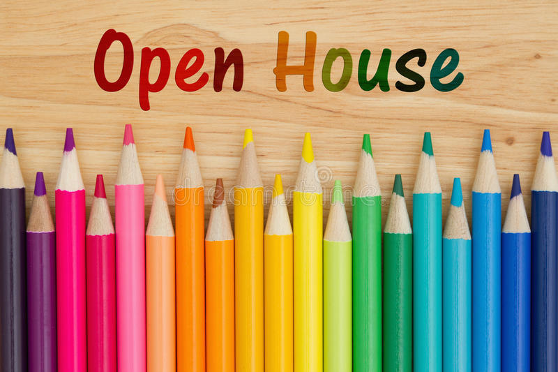 Open house sign with colored pencils