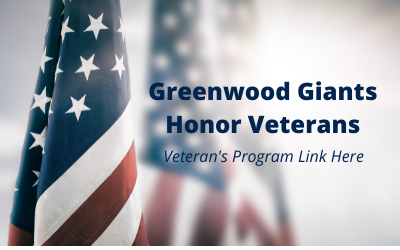 Flags in background of "Greenwood Giants Honor Veterans, Veteran's Program Link Here"