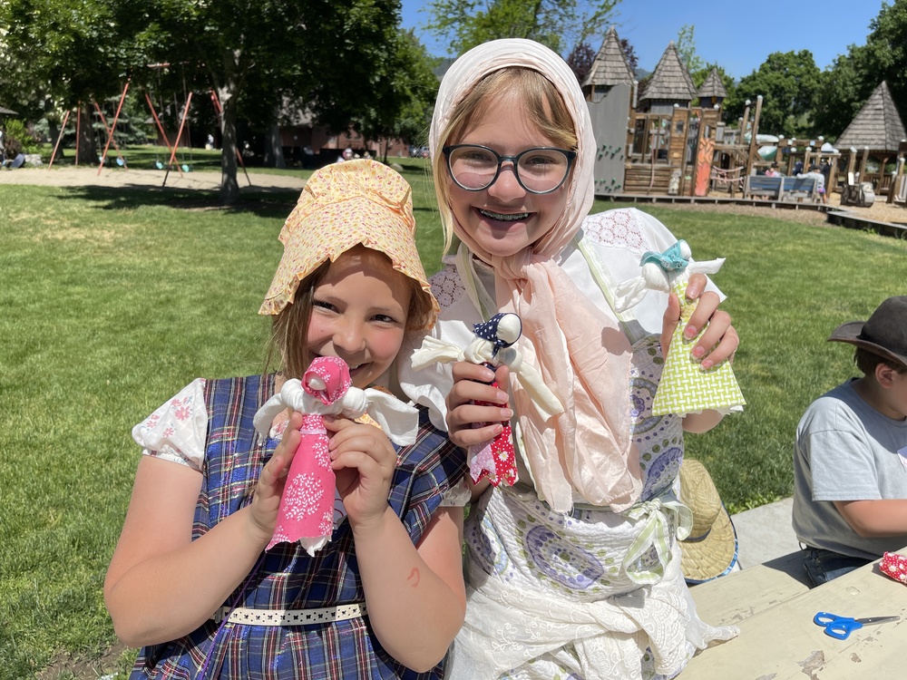 Picture of two students participating in Pioneer Days