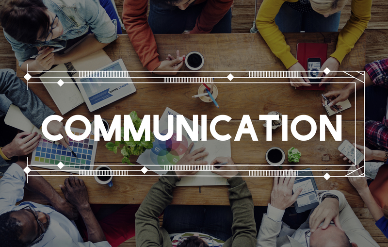Photo of group of people with communication devices