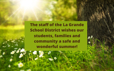 A forest scene with, "The staff of the La Grande School District wishes our students, families and community a safe and wonderful summer!