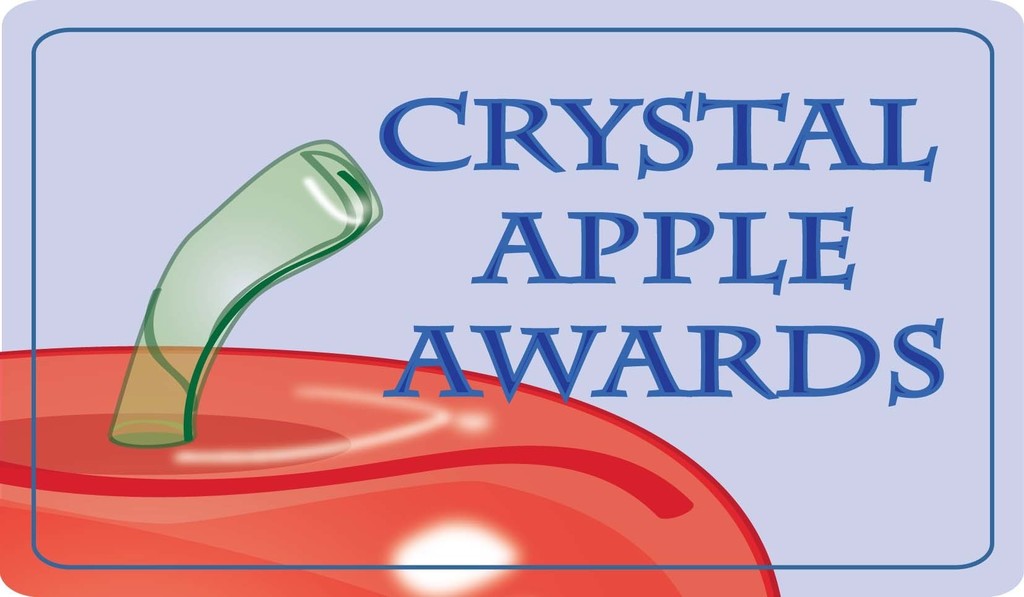"Crystal Apple Awards" with an image of a red and green crystal apple.